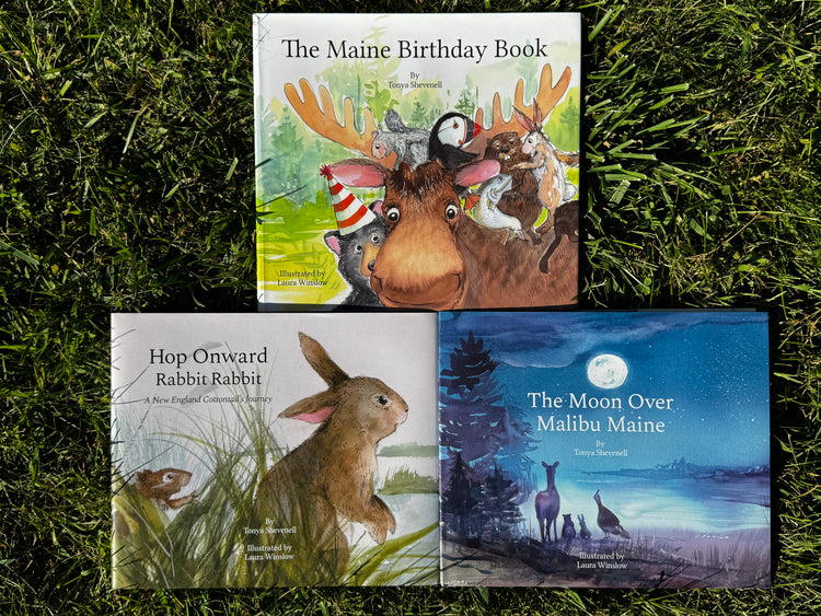 Hop Onward Rabbit Rabbit book with stuffed cottontail and The Maine Birthday Book with stuffed moose