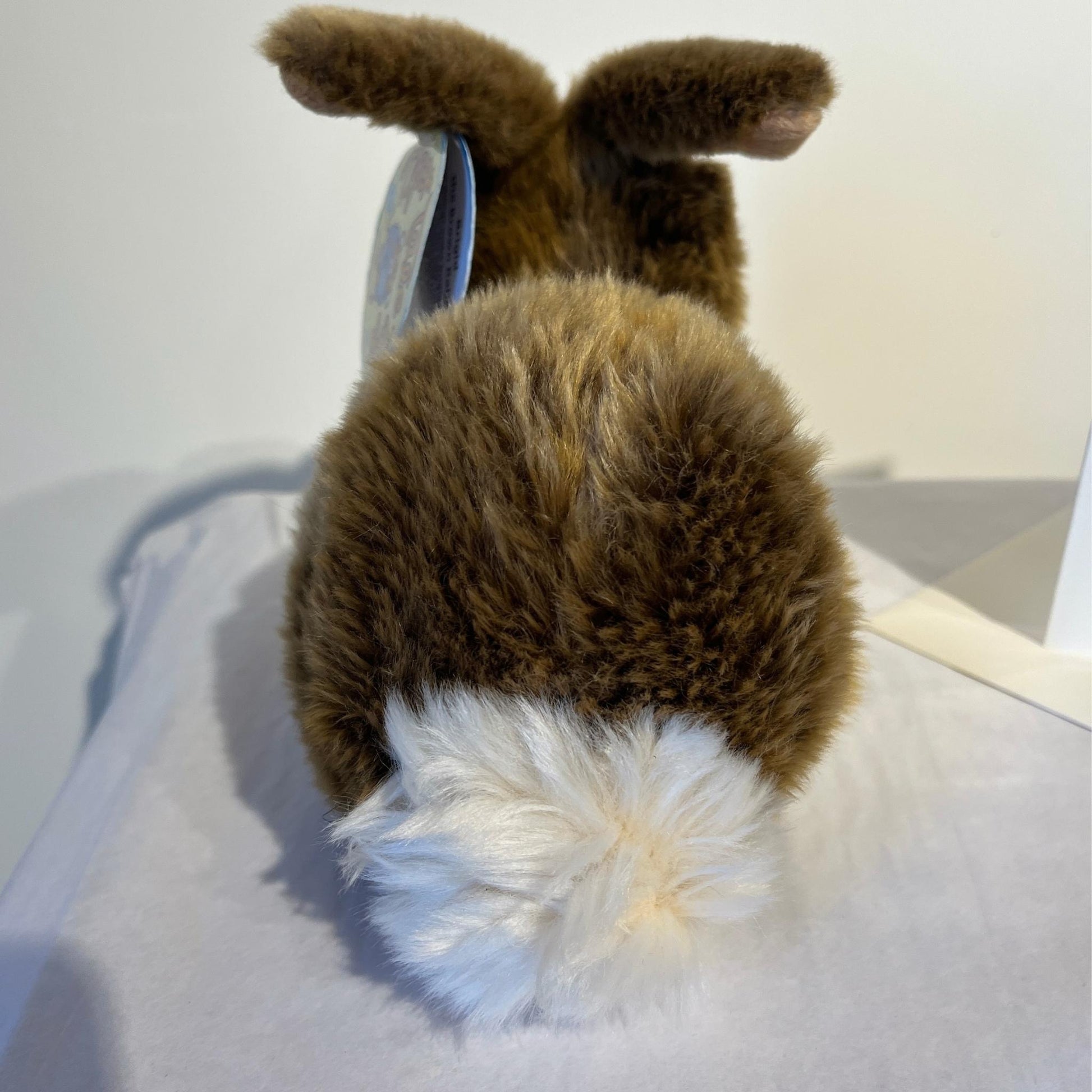 stuffed cottontail rabbit back view with cottontail